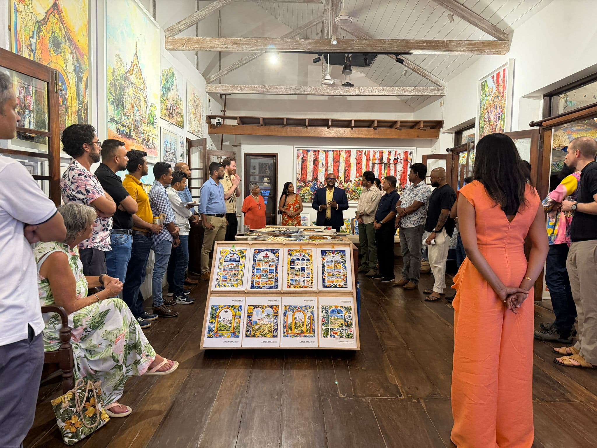 Founders gathered at a Southern Innovation Hub community event in a gallery